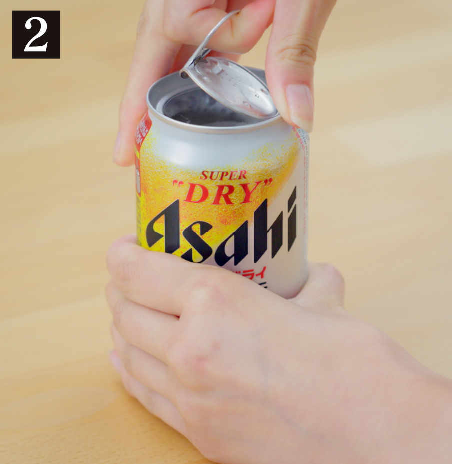 Pull tab toward you to open